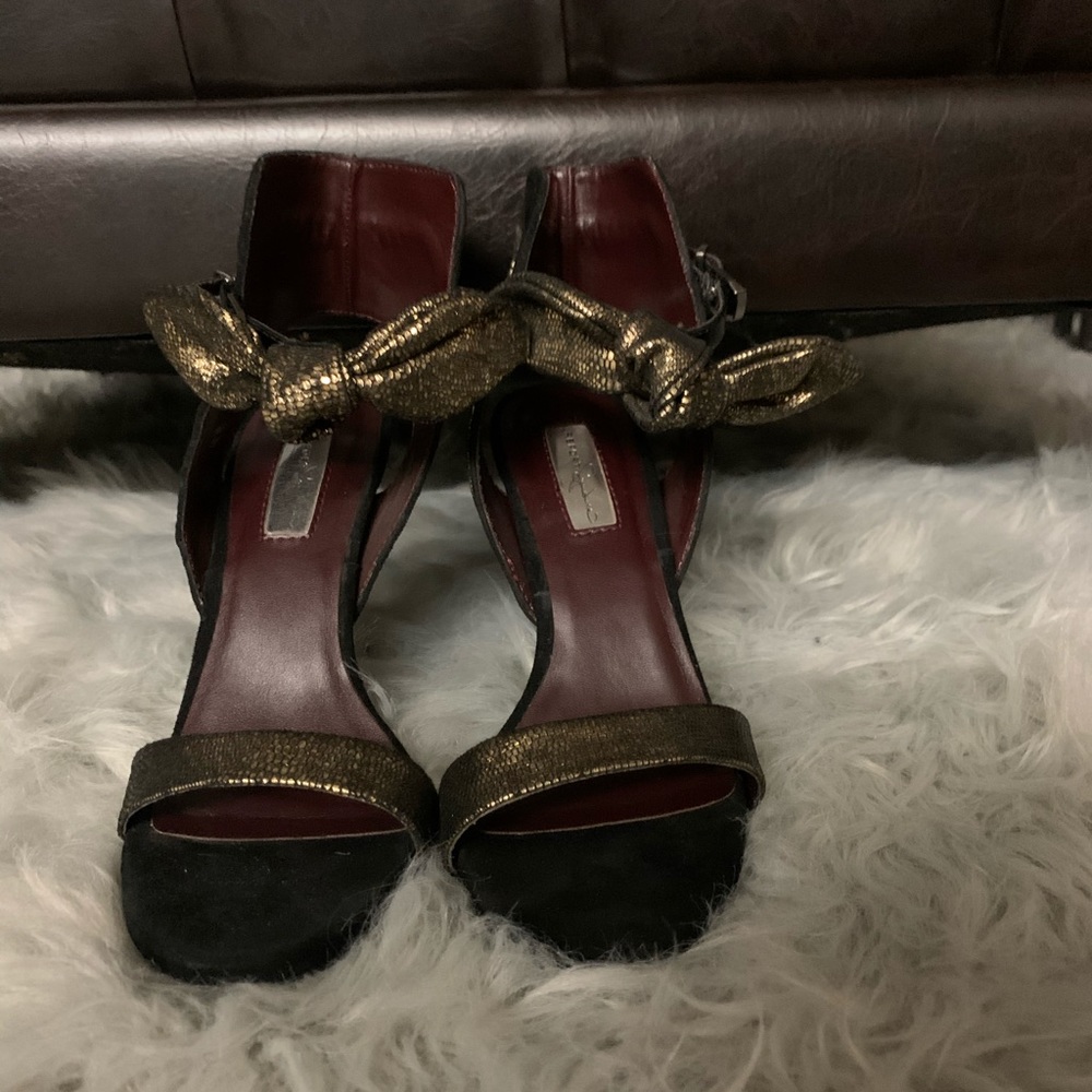 Brand new Report heels with a bow closure